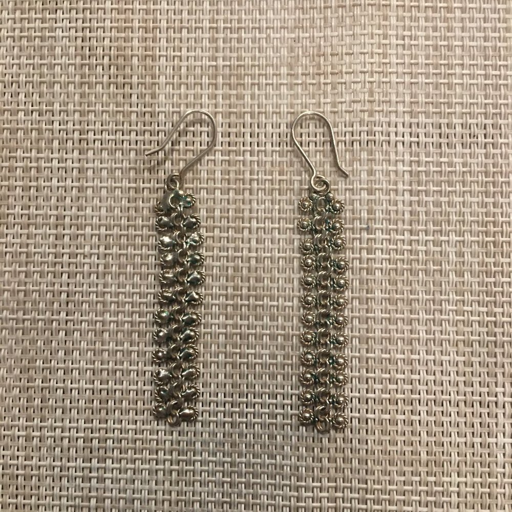 Silver drop earrings from Peru, indigenous design